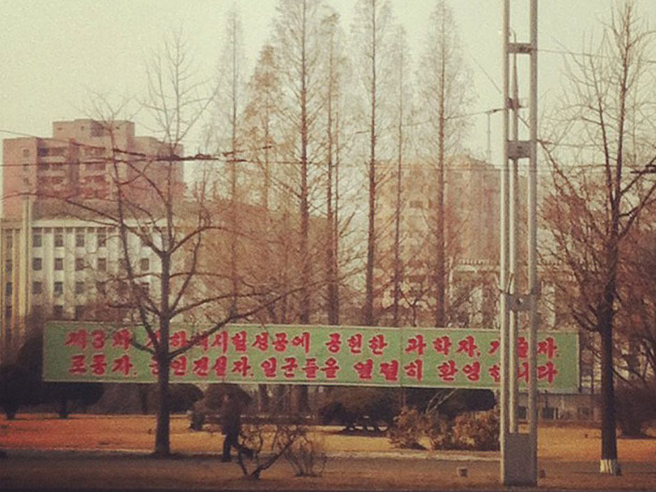 a man walks in pyongyang, north korea, under a new roadside banner referring to north korea\'s controversial feb. 12 nuclear test on monday, feb. 25, 2013. tweeting and uploading to instagram is pretty ordinary stuff <a href=